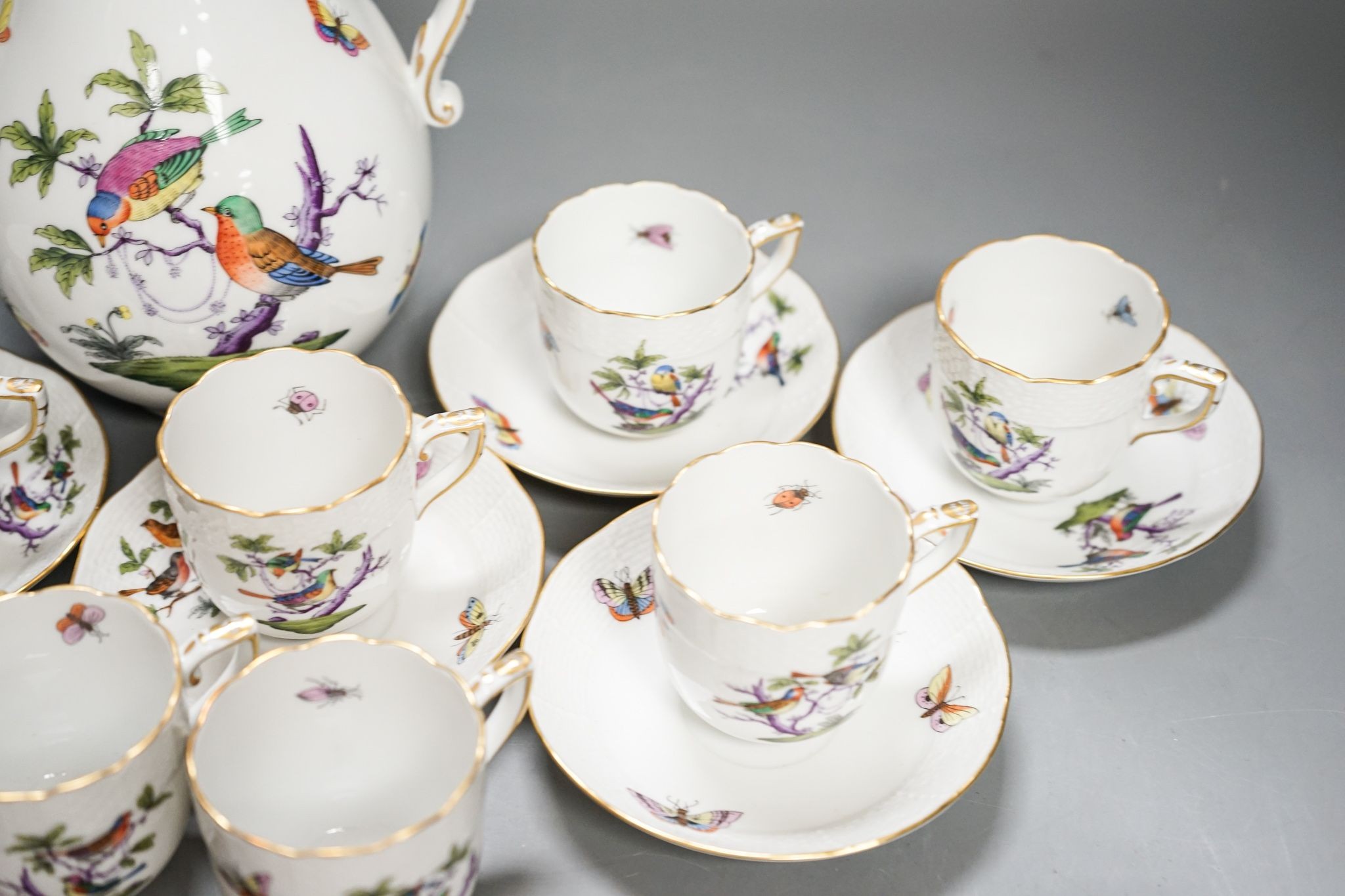 A Herend Rothschild birds pattern coffee pot and cover and eight coffee cups and five saucers
